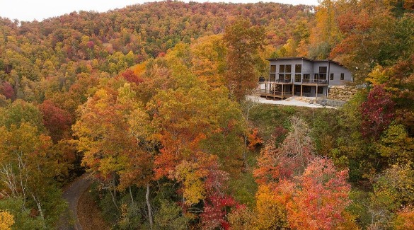 Fall foliage views from Azalea Creek Falls vacation rental | Watershed Cabins Bryson City Rentals