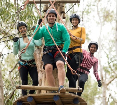 Friends ziplining | Watershed Cabins NC Smoky Mountain Rentals